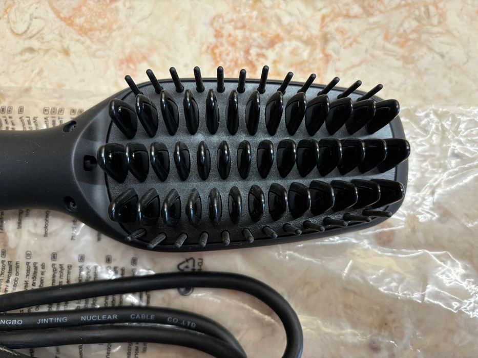 Escova alisadora eléctrica