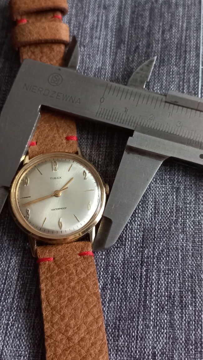 Sprzedam pozłacany męski zegarek Timex na pasku i z bransoletą