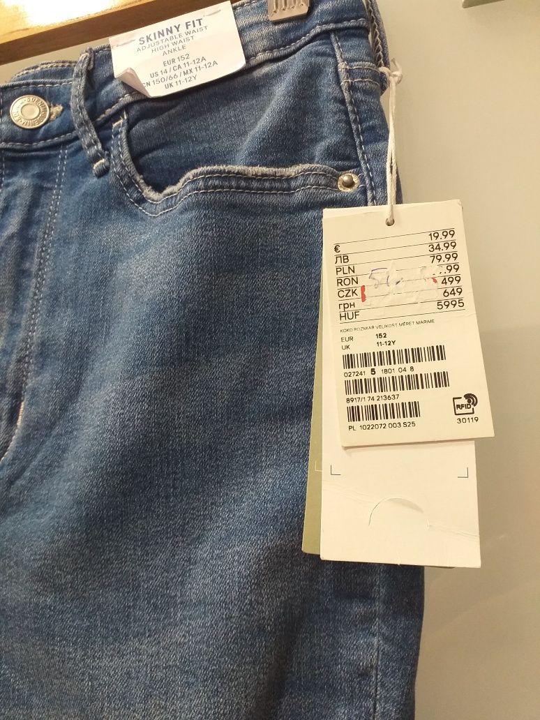 Nowe spodnie jeansy z dziurami, przetarciami H&M 152 cm