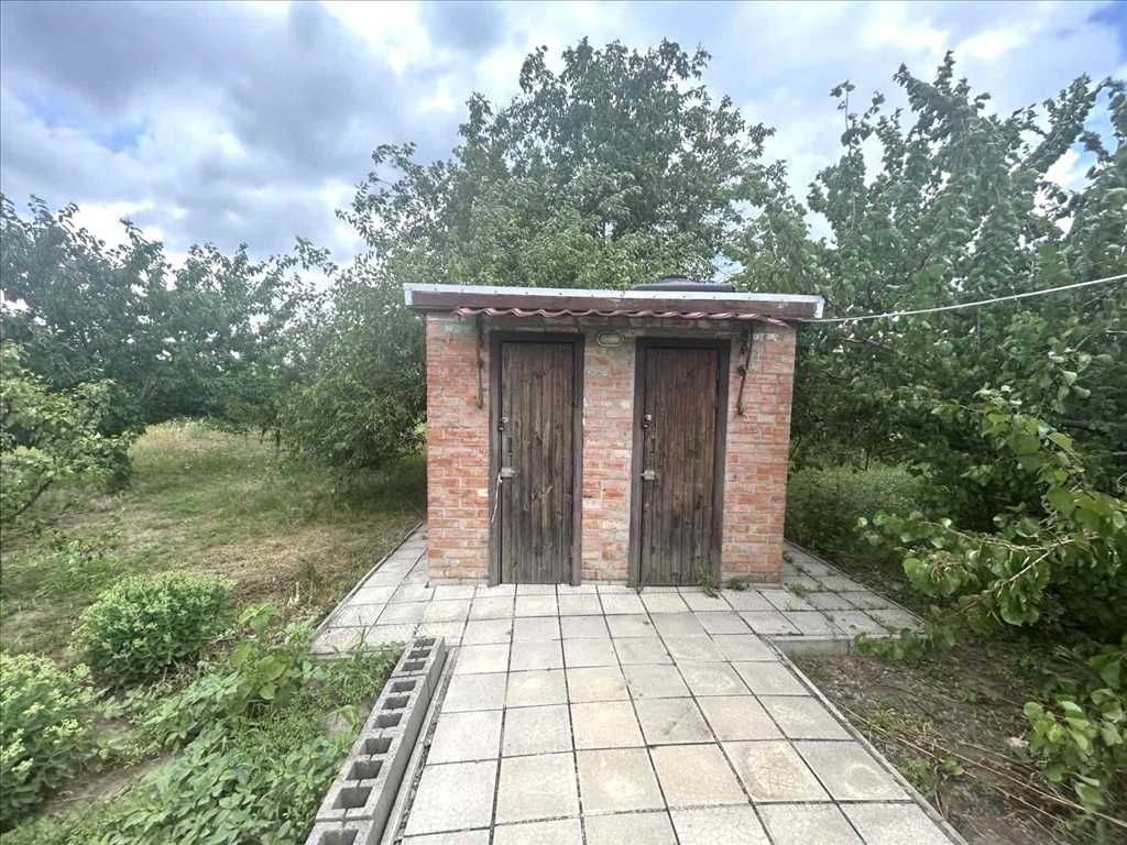 Затишний будинок з ділянкою в передмісті Полтави
