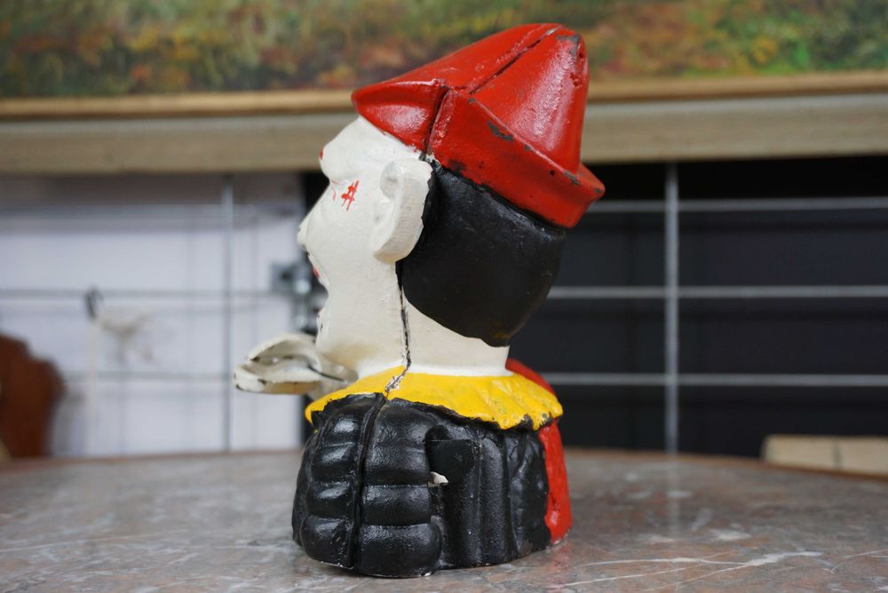 Stara ruchoma skarbonka żeliwna klaun