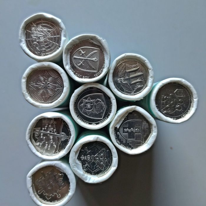 Памятні монети по 10 гривен в ролах і по штучно