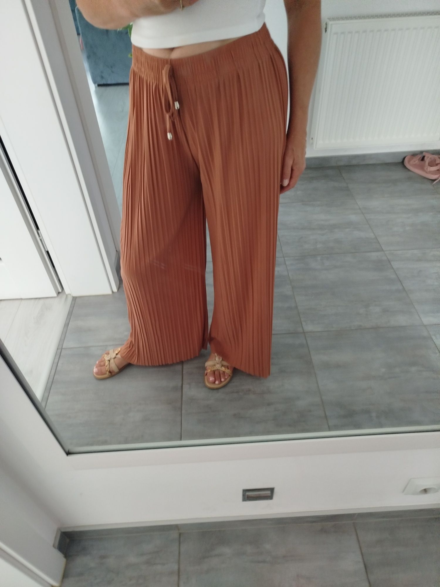 Spodnie damskie plisowane