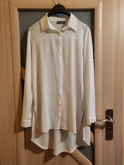 Biała koszula asymetryczna