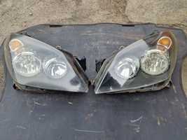 Lampy hella przód opel Astra H astra III komplet