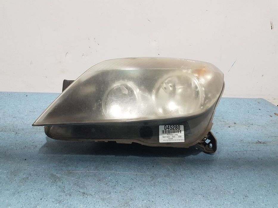 OPEL ASTRA H REFLEKTOR LEWY