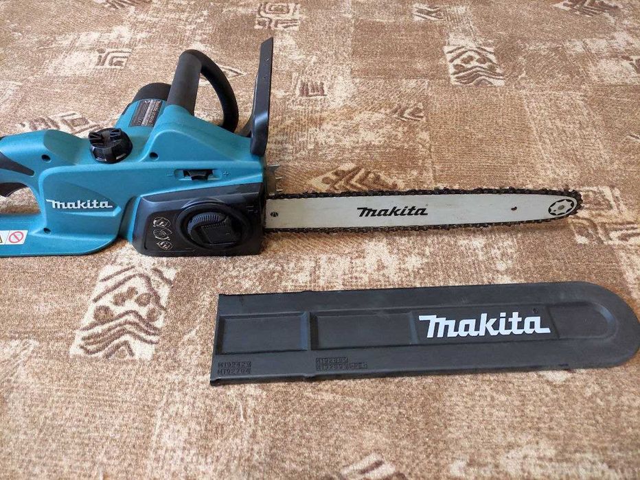 Електропила Makita UC4041A