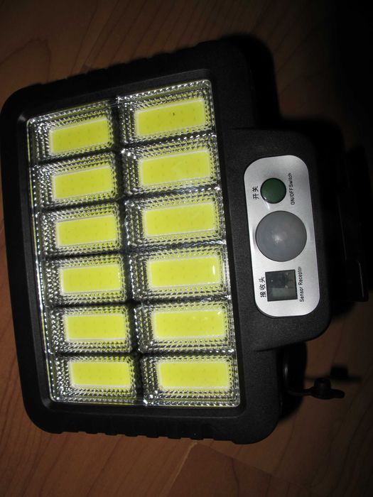 LED лампа + сонячна батарея + пульт ду і датчик руху