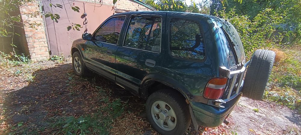 Внедорожник kia sporteg (рамная)  полноприводная