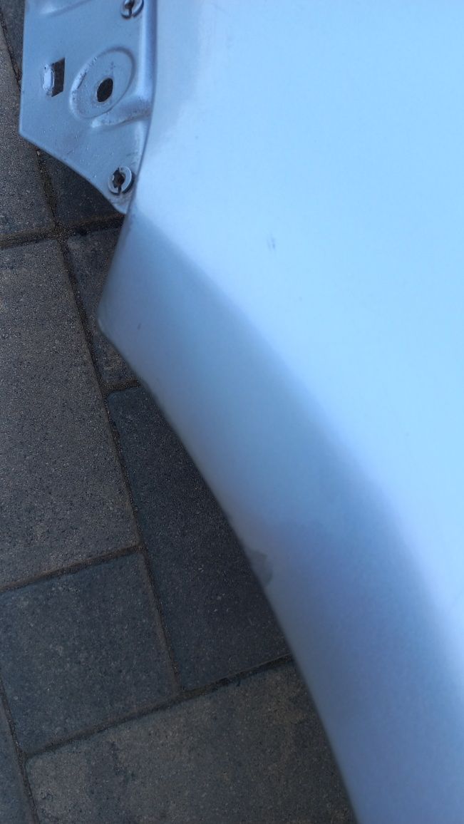 Vw touran 03-06 blotnik przedni lewy srebrny la7w