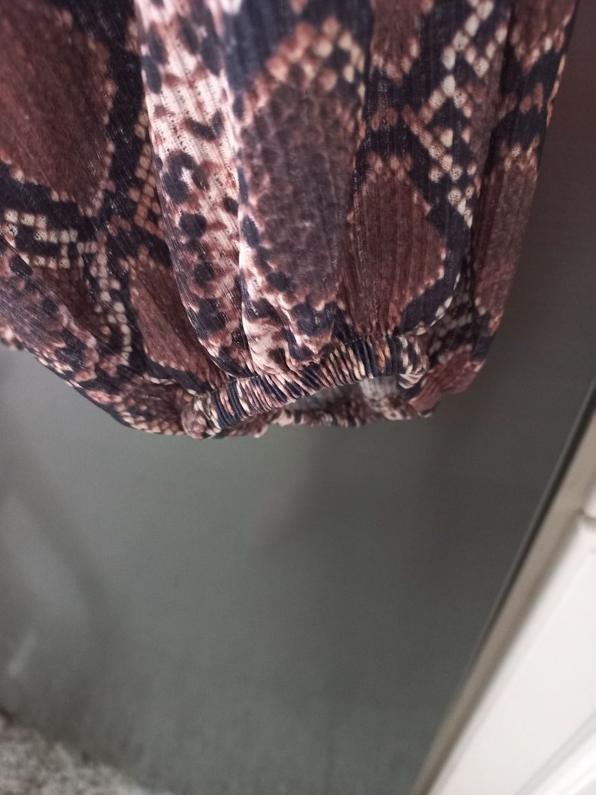 Camisa nova em tons de castanho