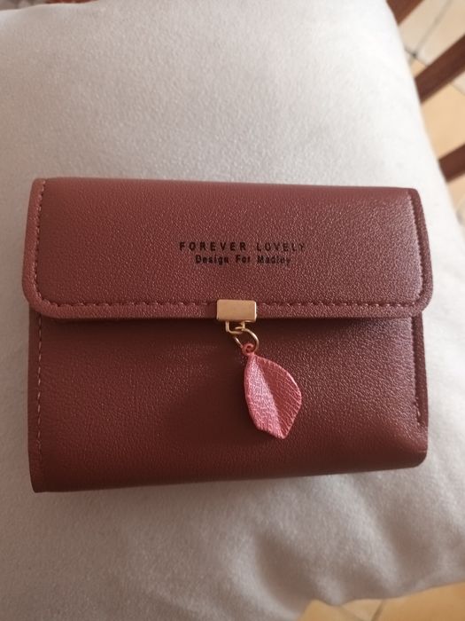 Nowy. Damski portfel