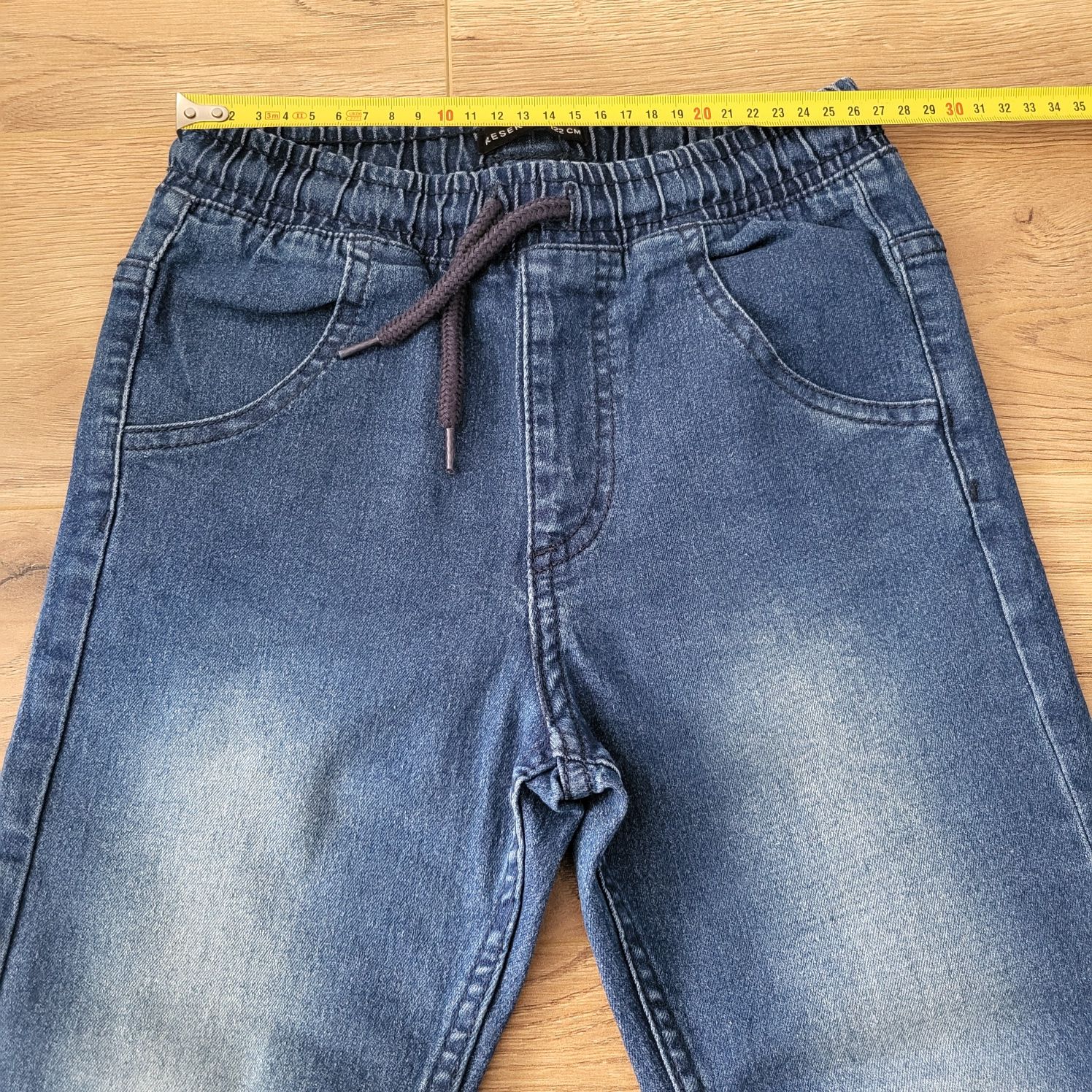 Spodnie jeansowe chłopięce jogery r.122 Reserved