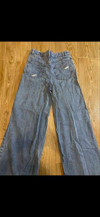 джинси кльош з потертьостями