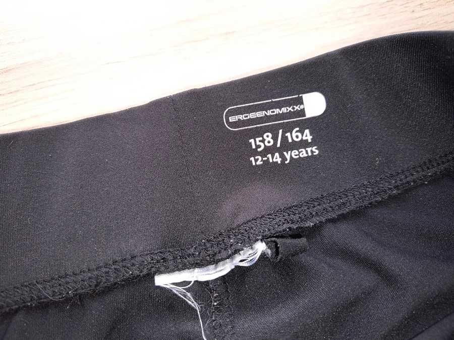 Ergeenomixx * czarne dziewczęce legginsy sportowe 3/4 * 158/164