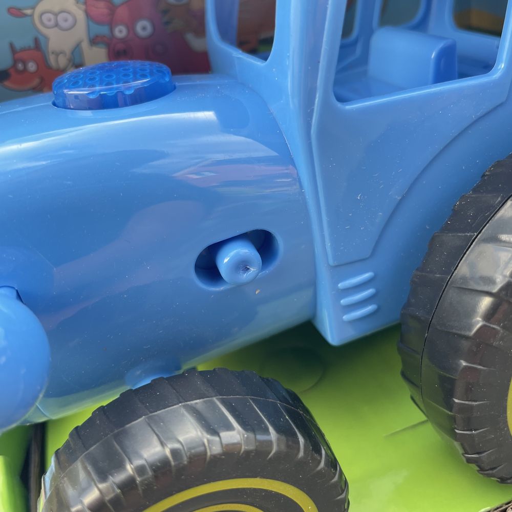 Игрушка Синий трактор с веревкой украинская озвучка