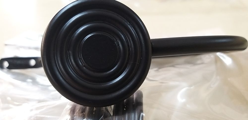 Prendedor de Cortinado.