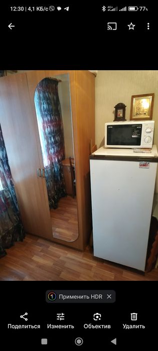 Комнату в доме гостиного типа