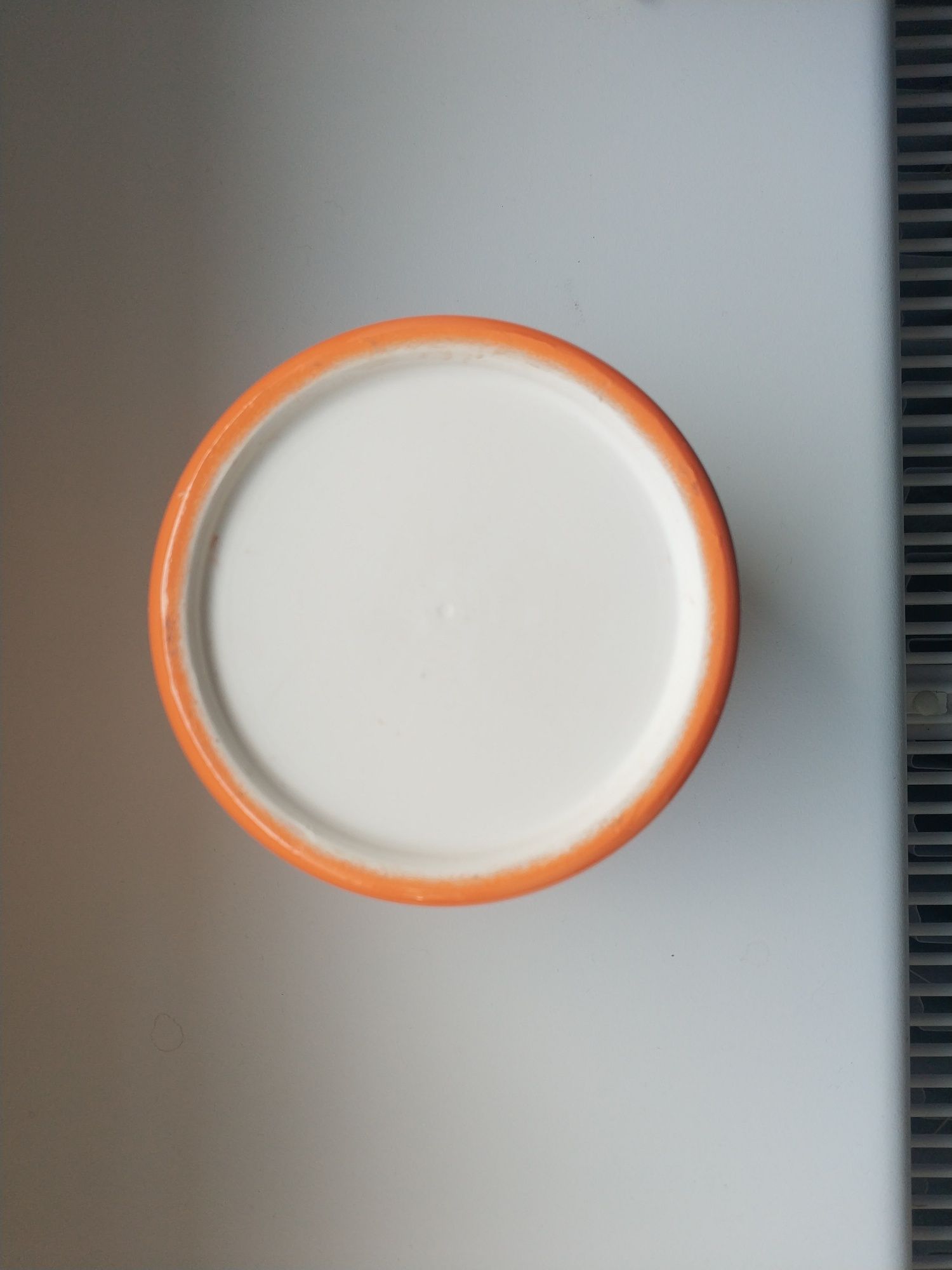 Pomarańczowa ceramiczna osłonka na doniczkę śr. 11 cm na prymulkę