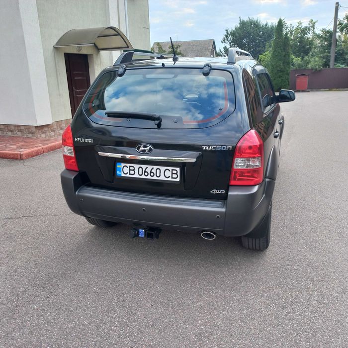 Hyundai Tucson, I покоління  2.0 DOHC МТ (142 к.с.) 4WD  Base