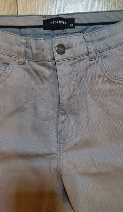 Spodnie męskie slim Reserved rozm. 30
