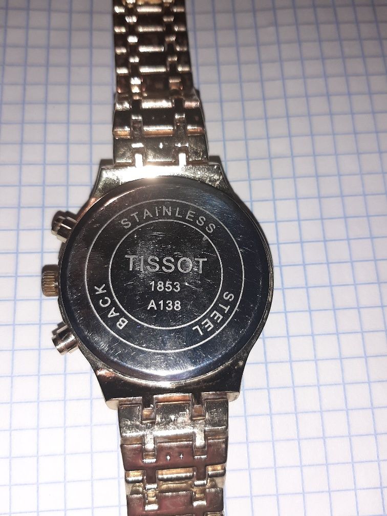 Электронные часы Tissot.