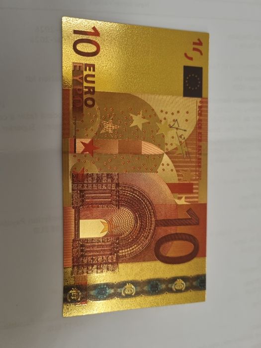 Notaa de colecao douradas