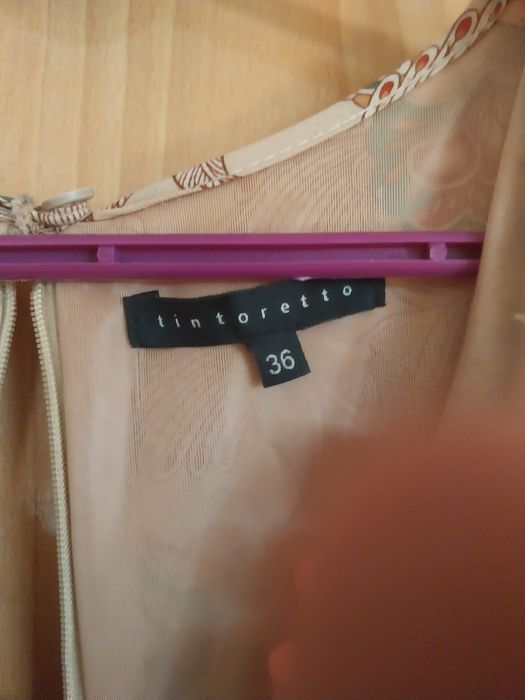 Lote com casacos e vestidos