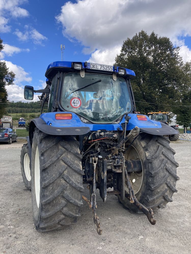 New Holland TS100A z Turem