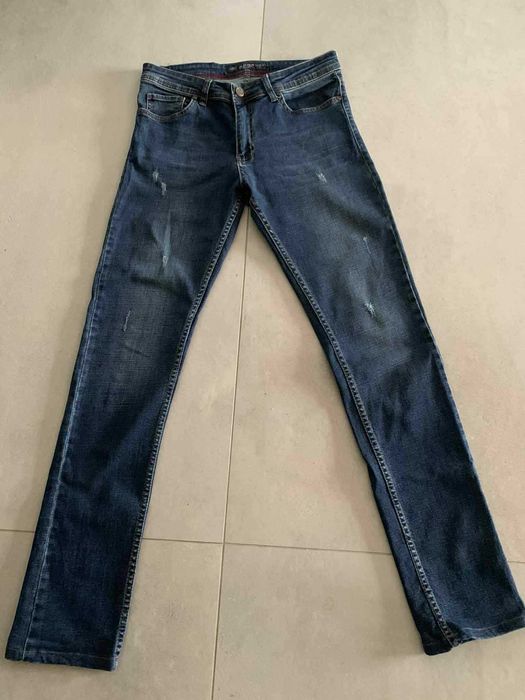 Spodnie dżinsowe męskie z przetarciami - Armani Jeans