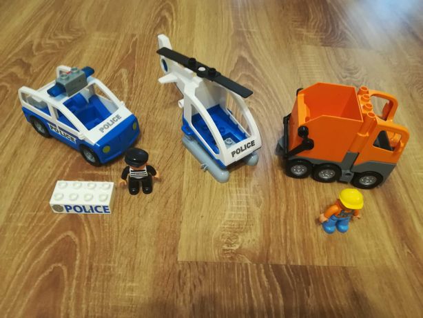 Lego Duplo pojazdy, helikopter, radiowoz, śmieciarka plus ludziki
