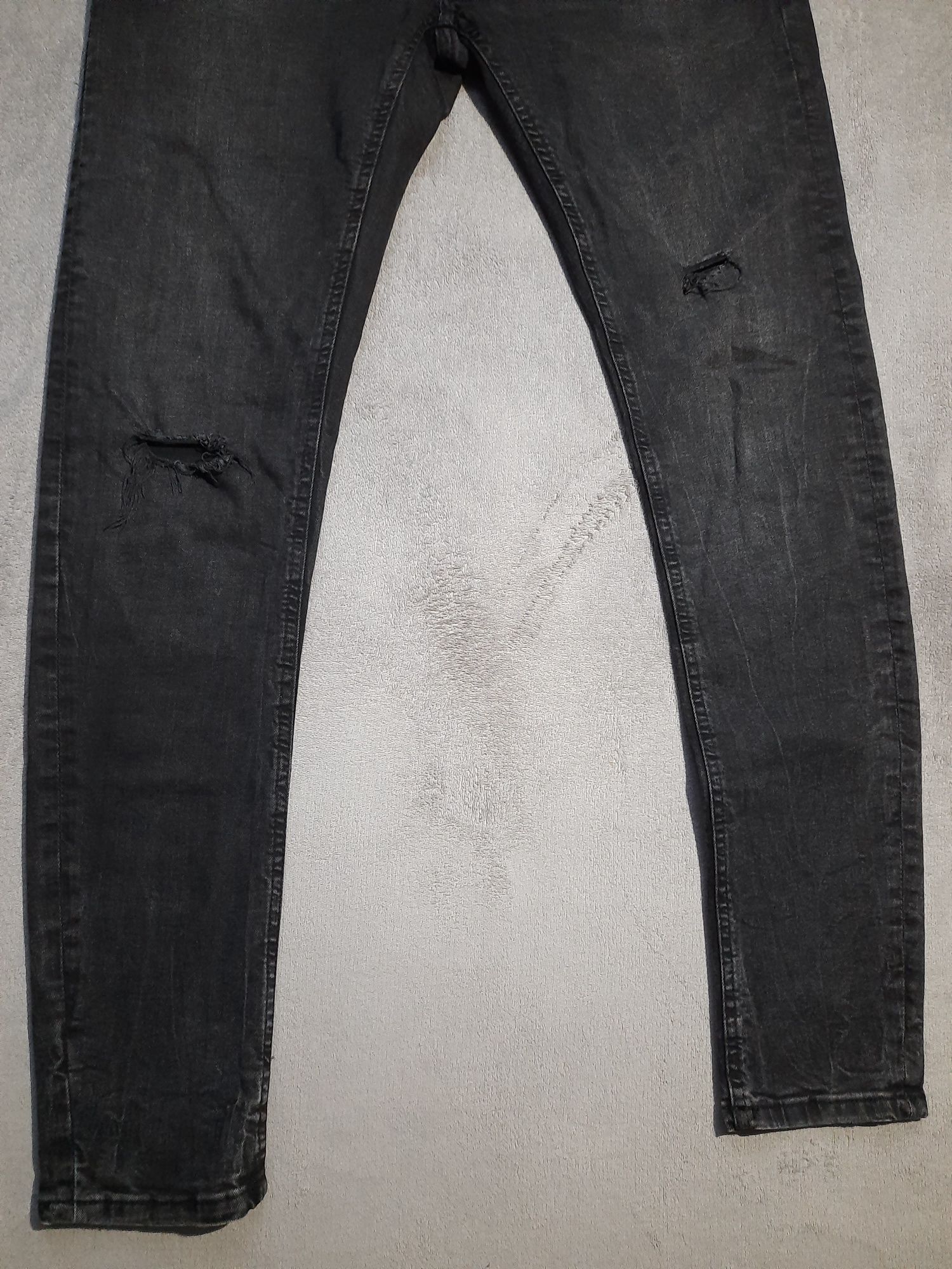 Czarne spodnie jeansowe męskie z dziurami skinny House