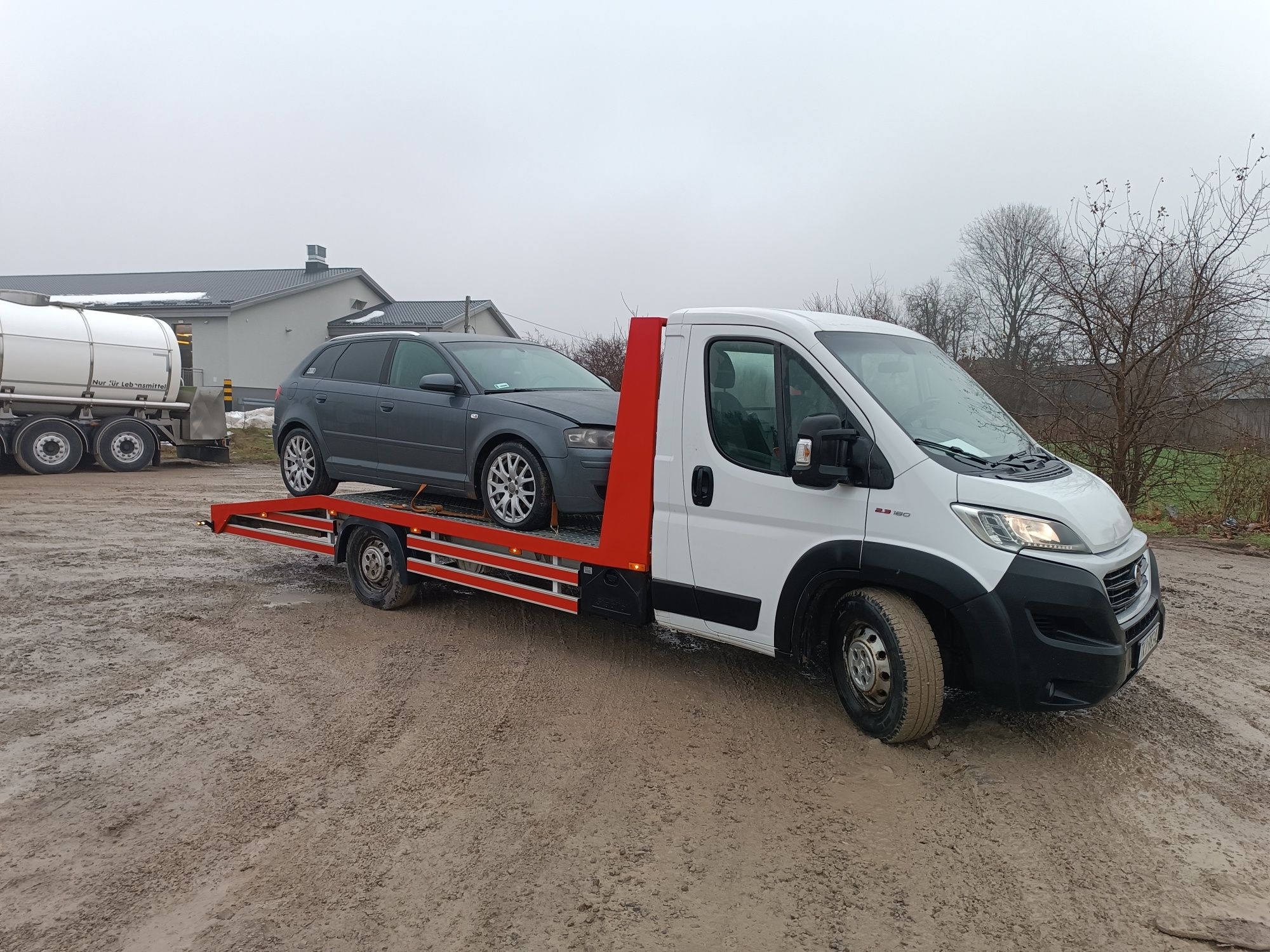 Usługi transportowe laweta pomoc drogowa transport przewóz