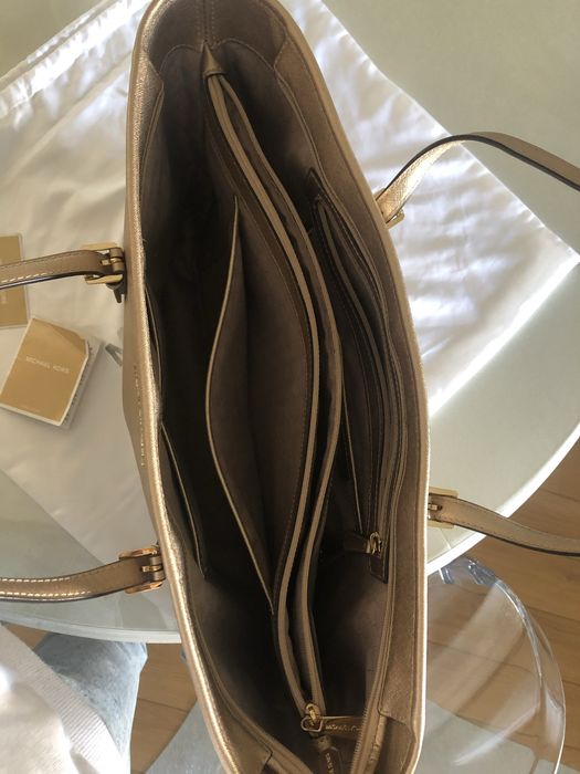 Mala michael kors dourada