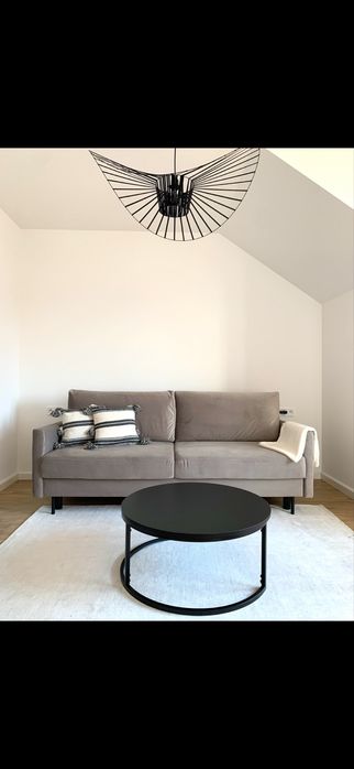 Sofa beżowa szara z funkcja spania nowoczesna rozkladana