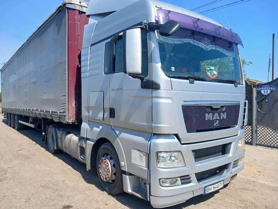Продам комплект МАН TGX 18.440 2008 год, прицеп Крона борт штора 2007
