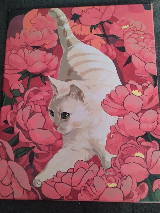 Картина ручної роботи "Кіт у квітах"
квітах"