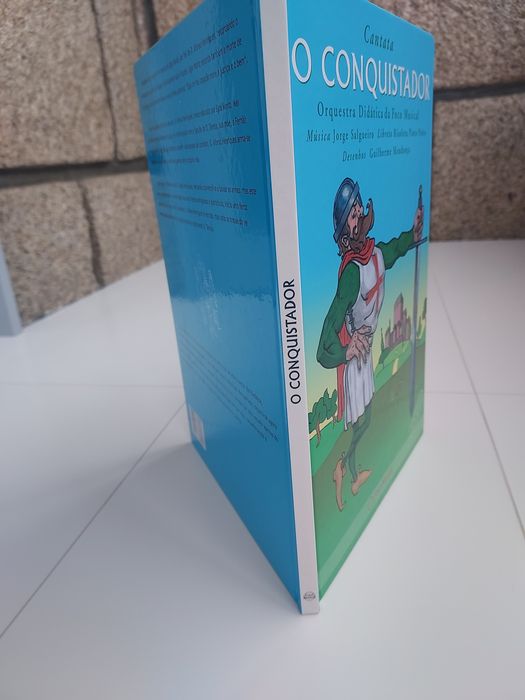 Livro " O Conquistador" com CD.