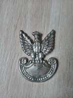Metalowy orzełek bez korony zabytkowy emblemat wojskowy