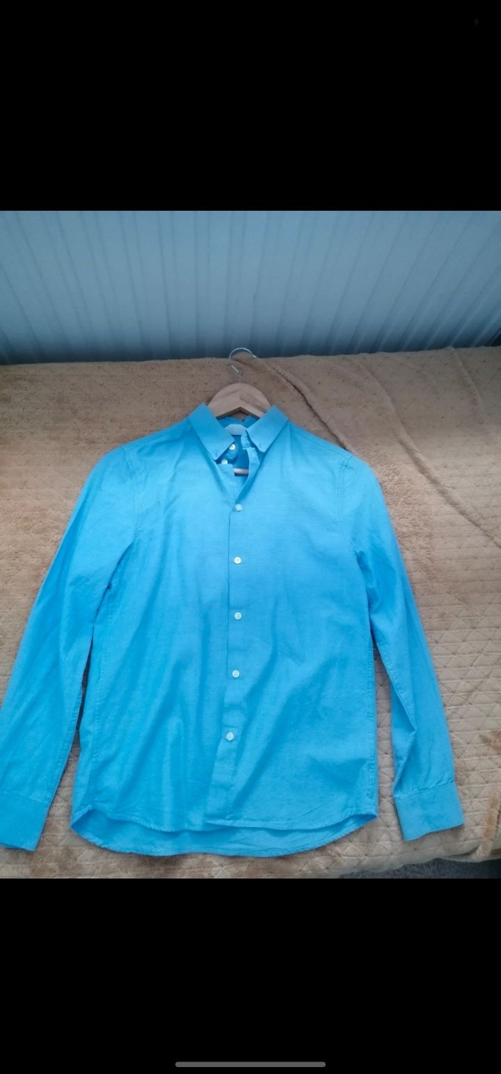 Męska niebieska koszula 164