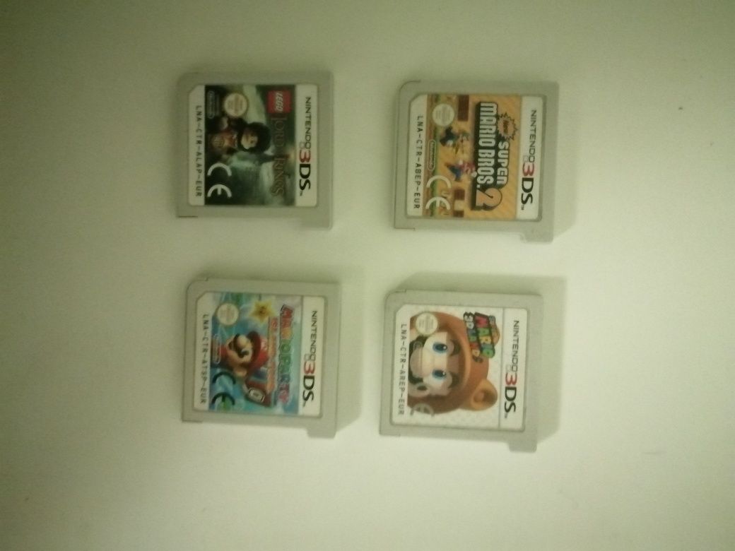Nintendo Switch Lite cinza com acessórios, Ps3 com acessórios e jogos