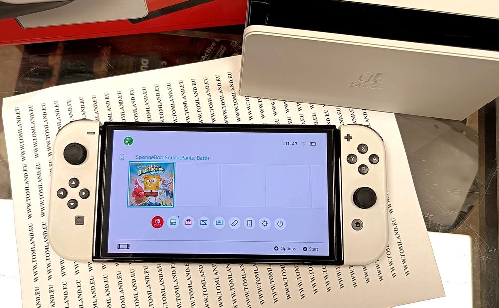 Konsola Nintendo Switch OLED biała stan idealny + karta 128GB + etui