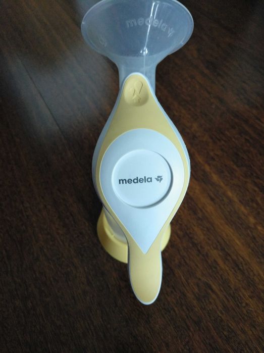 Bomba tira leite manual  e cx de 3 frascos da medela