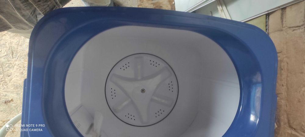 новая пластиковая стиральная машина как старая круглая Советская