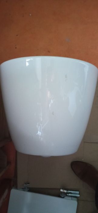 Sanita Suspensa ROCA Rimless, c/ tampo queda amortecida