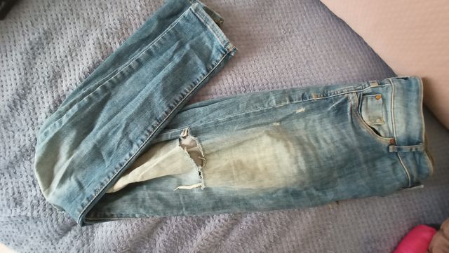 Spodnie jeansowe z dziurami rozmiar 38