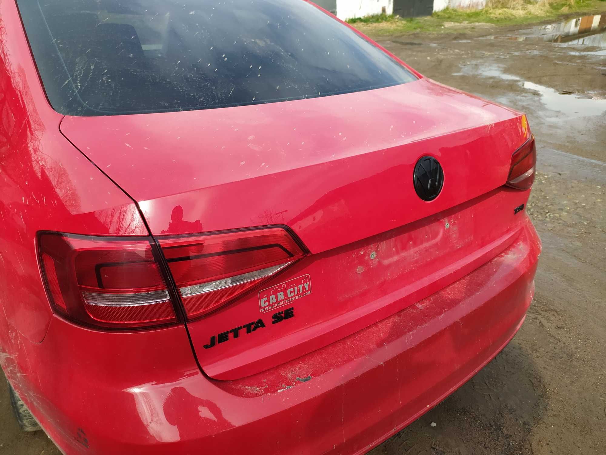 Задні фонарі VW Jetta 6.  стопи в кришку багажніка Джетта 6.
