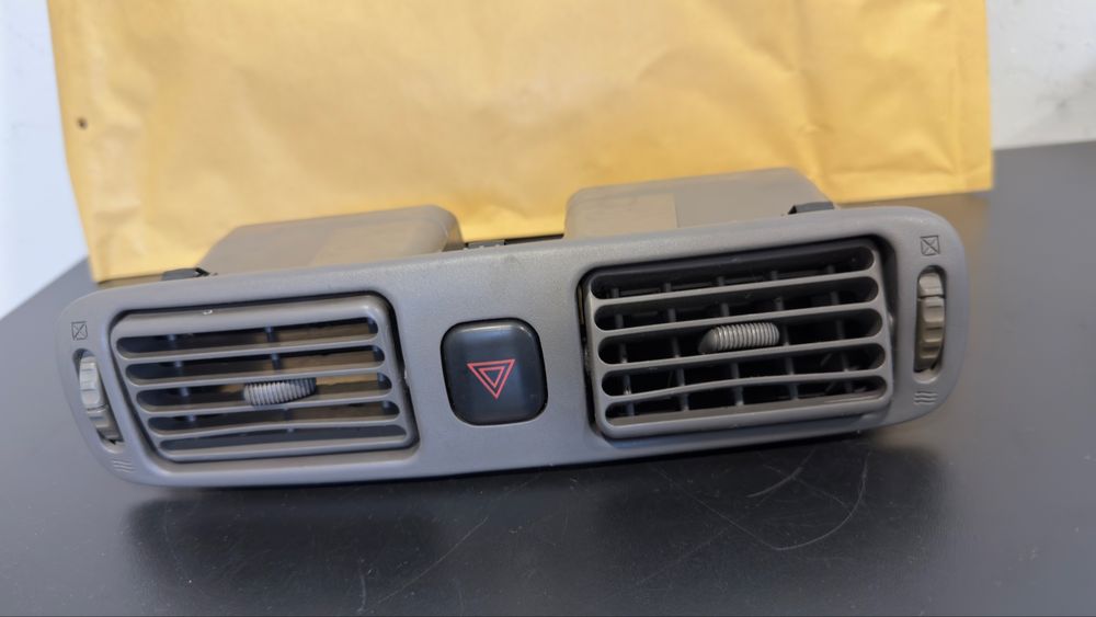 saídas de ar central Toyota corolla  star van