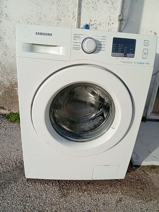 Máquina de lavar com defeito