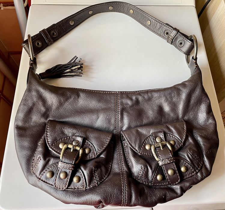 Mala em pele com tachas